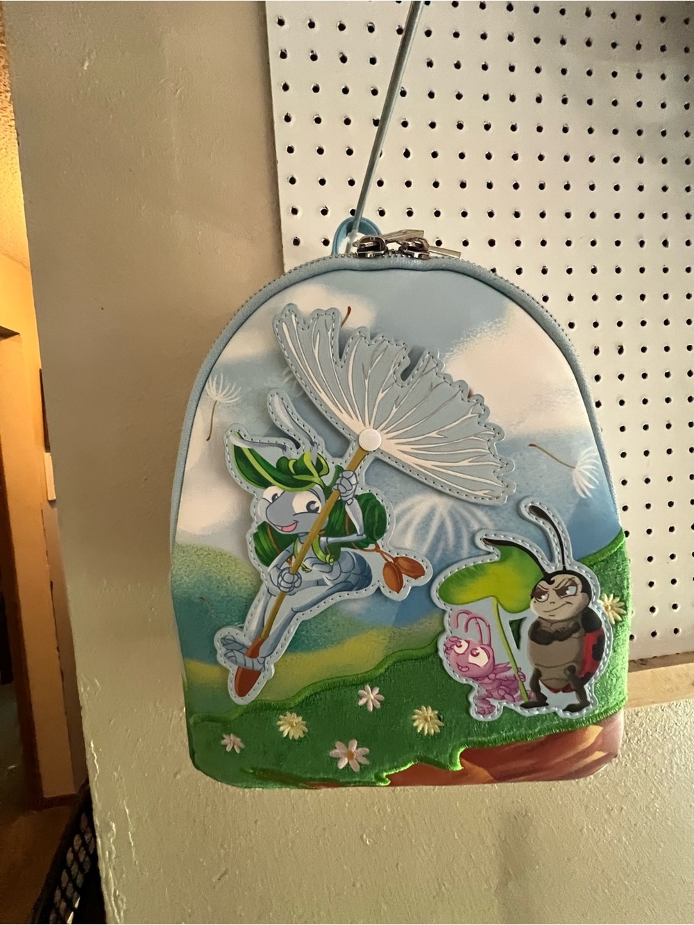 Loungefly Light Blue Garden Bugs Life Mini Backpack with Green and Pink Accents